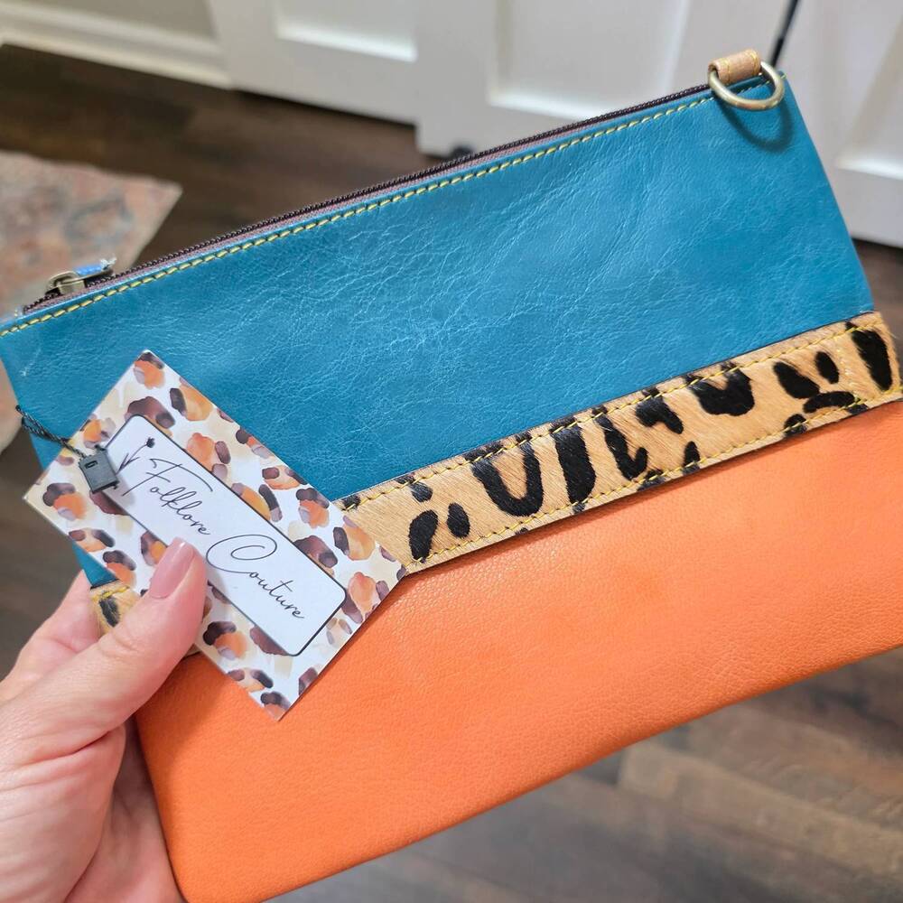 NEW FOLKLORE COUTURE women's luca leather and hair on hide wristlet clutch cross